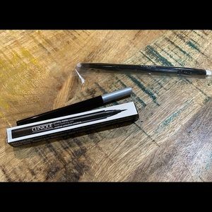 Lancôme eye shadow brush and Clinique eye liner